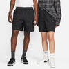 Two men standing next to each other in Nike SB Skyring Skate Short Loose Fit Black shorts.