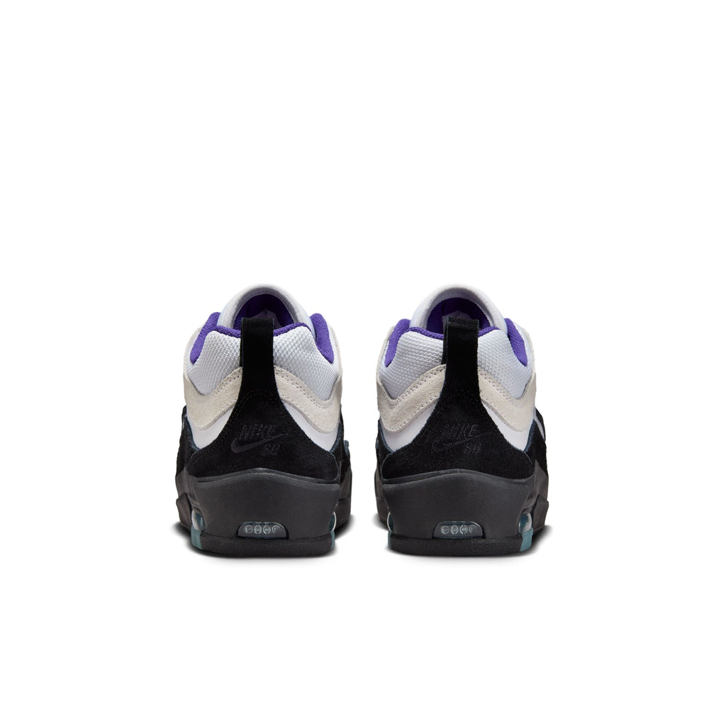 Rear view of a pair of nike NIKE SB ISHOD 2 AIR MAX skateboarding sneakers in white, black, and court purple on a plain white background.