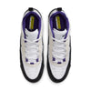Top view of a pair of nike SB Ishod 2 Air Max sneakers in white, black, and court purple with yellow insoles labeled "ISHOD.