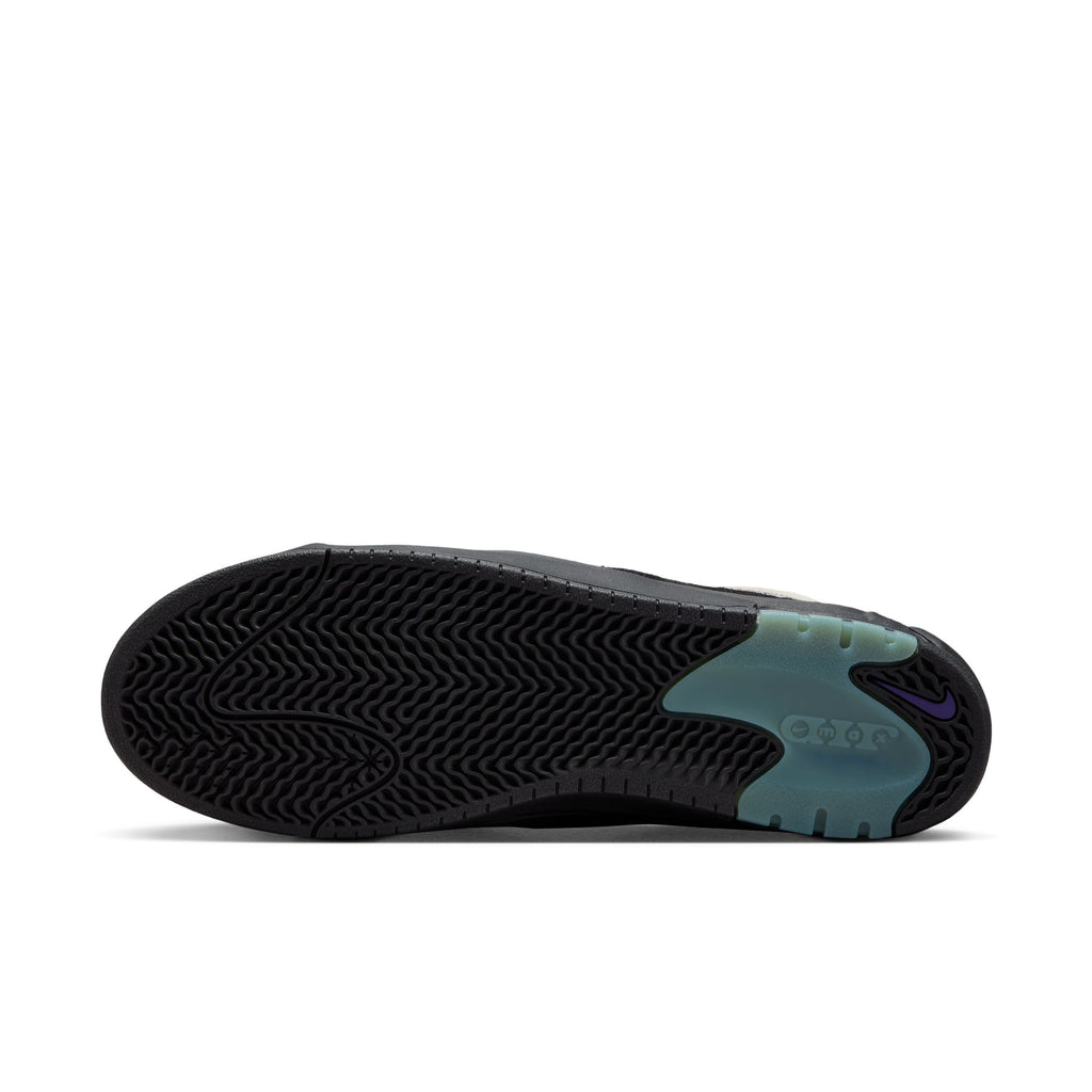 The image shows the outsole of the NIKE SB ISHOD 2 AIR MAX in white/black-court purple-black, featuring a wavy tread and translucent rubber near the heel with visible nike branding—hallmarks of high-performance skate shoes.