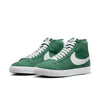 The NIKE SB BLAZER MID FIR / WHITE skate shoes are green and white.
