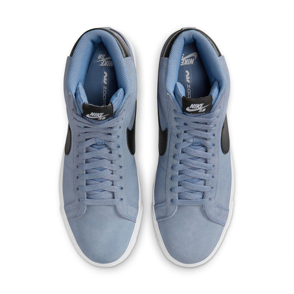 A top view of a pair of blue Nike SB Blazer Mid Ashen Slate/Black sneakers with Zoom Air cushioning.