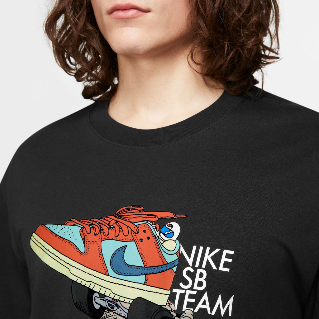 A close up of a black shirt with a graphic of a red and blue dunk that looks like a race car.