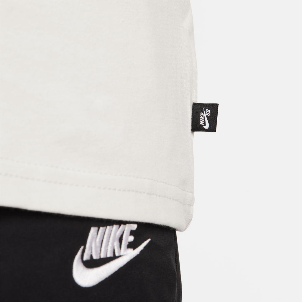 nike SB 'Sports Guy' skate tee in light bone. Featuring a sleek design perfect for the Sports Guy or anyone into skateboarding with its nike SB style.
