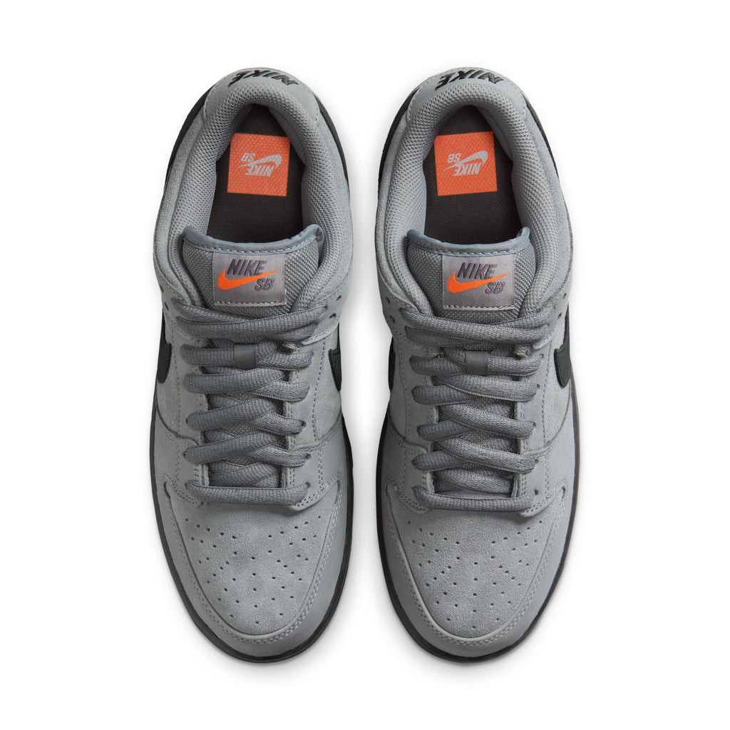 Top view of nike SB DUNK LOW PRO COOL GREY / BLACK-COOL GREY-DARK GREY skateboarding shoes in gray with black swooshes, orange insoles, and gray laces on a white background.