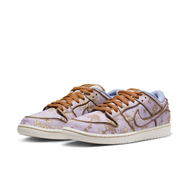 Discover the nike NIKE SB DUNK LOW "CITY OF STYLE" FOOTBALL GREY / COCONUT MILK, a pair of sneakers showcasing a floral pattern on a lavender background, brown laces, and white soles. These shoes blend seamlessly into any City of Style collection with their unique design.