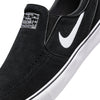 Close-up of the NIKE SB JANOSKI+ SLIP in black, showcasing a white swoosh, tongue label, and thick white sole. Features Zoom Air cushioning and skate-specific tread for optimal performance.