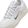 The nike NIKE SB NYJAH 4 WHITE / BLACK-WHITE-BLACK skateboarding shoe features a mesh upper, translucent sole, white laces, and a dark gray Swoosh, designed for lightweight durability and style.