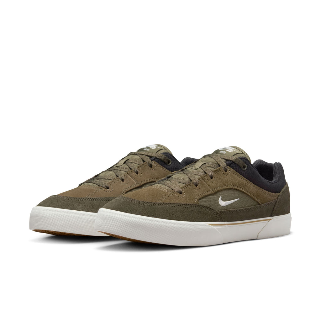 A pair of NIKE SB MALOR sneakers in medium olive, sail cargo khaki, and black with a white swoosh logo, slightly angled, against a white background.