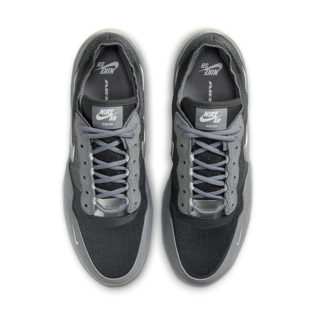 Top view of the NIKE SB PS8 sneakers in Cool Grey and Metallic Silver, featuring a visible brand logo on the tongue and Flyknit construction for a snug fit.