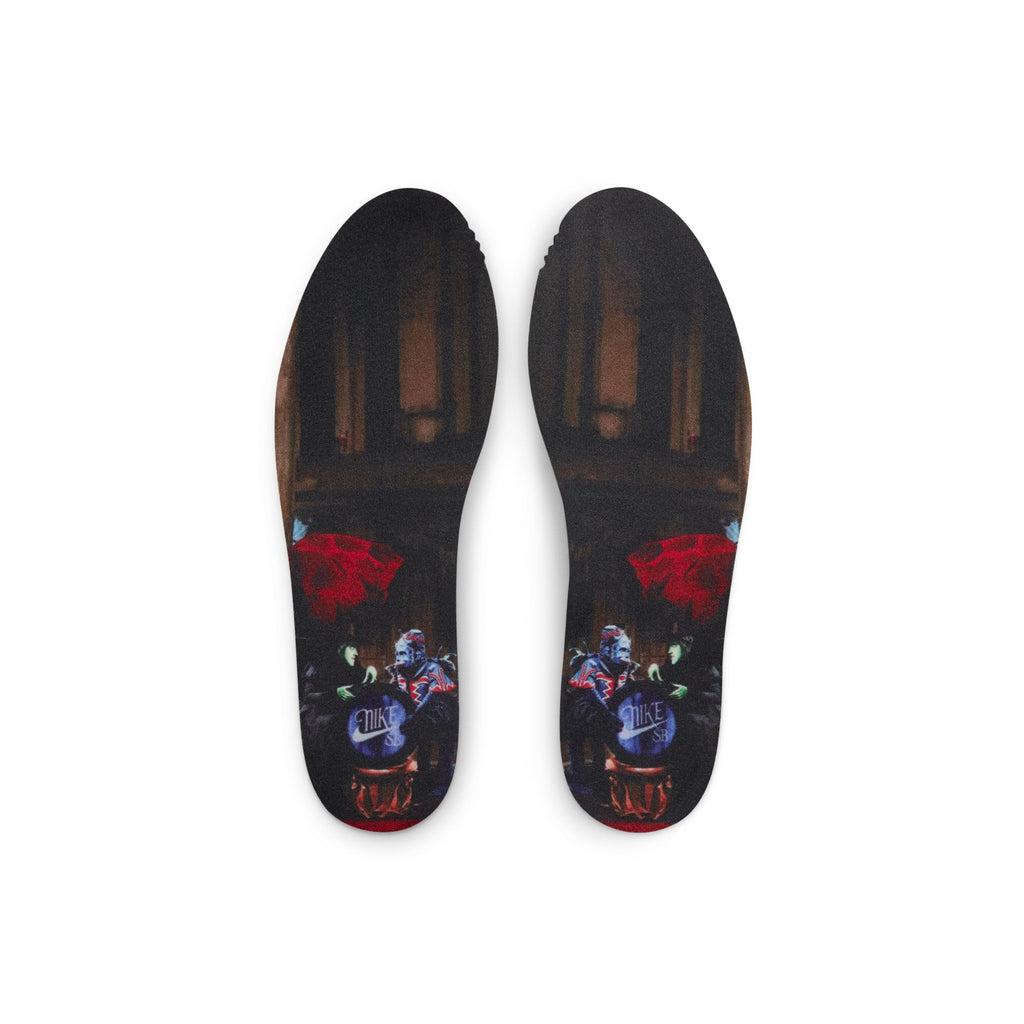 The NIKE SB DUNK LOW 👠💚 LITTLE KIDS' shoe insoles by Nike feature a colorful graphic design with character art, playful text, and vibrant red and purple accents that stand out on a dark background, perfect for skateboarding or everyday adventures.