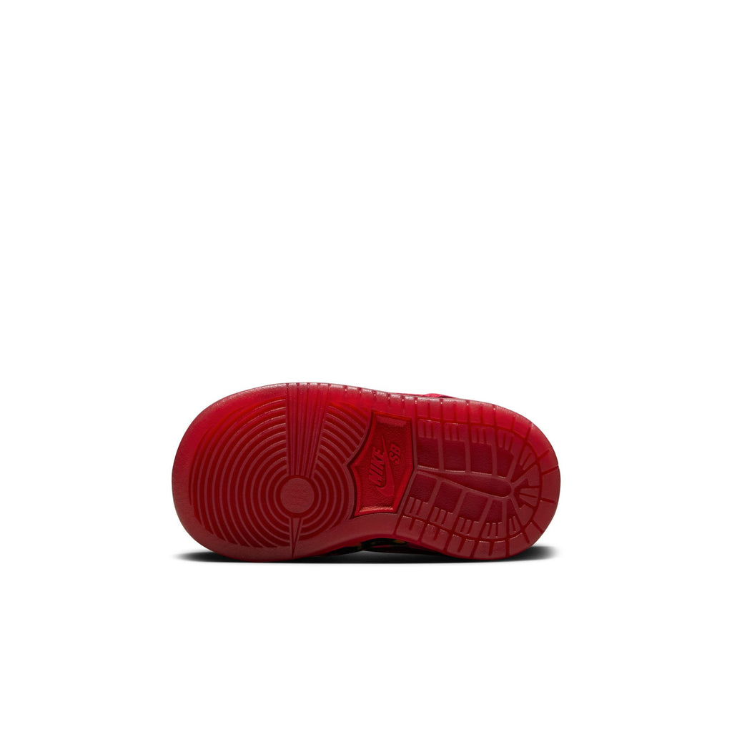 The image displays the sole of a nike SB Dunk Low 👠💚 toddler sneaker, viewed from below, evoking a scaled-down design ideal for little feet.