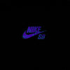 Showcasing a purple and blue cracked design, the nike logo stands out on the black backdrop of the NIKE SB SPIDER TEE BLACK GLOW IN THE DARK.