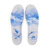 The NIKE SB X NICOLE HAUSE DUNK LOW PRO showcases blue and white cloud-patterned insoles adorned with "Victory Temple" and "Nike SB" lettering, coupled with the Dunk Low design, and upgraded with Air Zoom cushioning for unparalleled comfort.