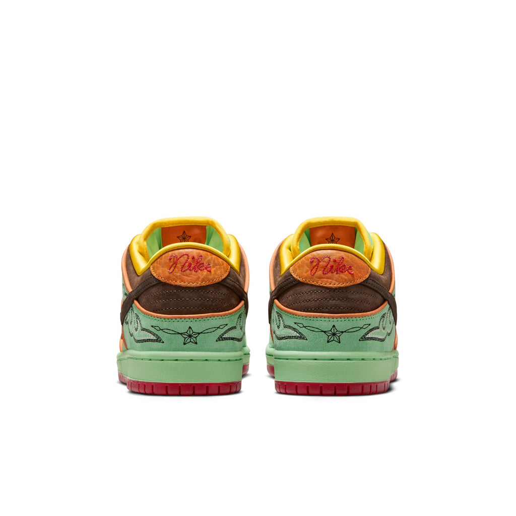 A pair of NIKE SB RODEO DUNK LOW TOURMALINE/BAROQUE BROWN-MONARCH sneakers by Nike, seen from the back, showcasing green soles, brown and yellow uppers, and red accents.