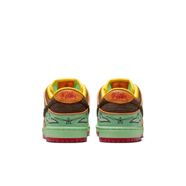 A pair of NIKE SB RODEO DUNK LOW TOURMALINE/BAROQUE BROWN-MONARCH sneakers by Nike, seen from the back, showcasing green soles, brown and yellow uppers, and red accents.