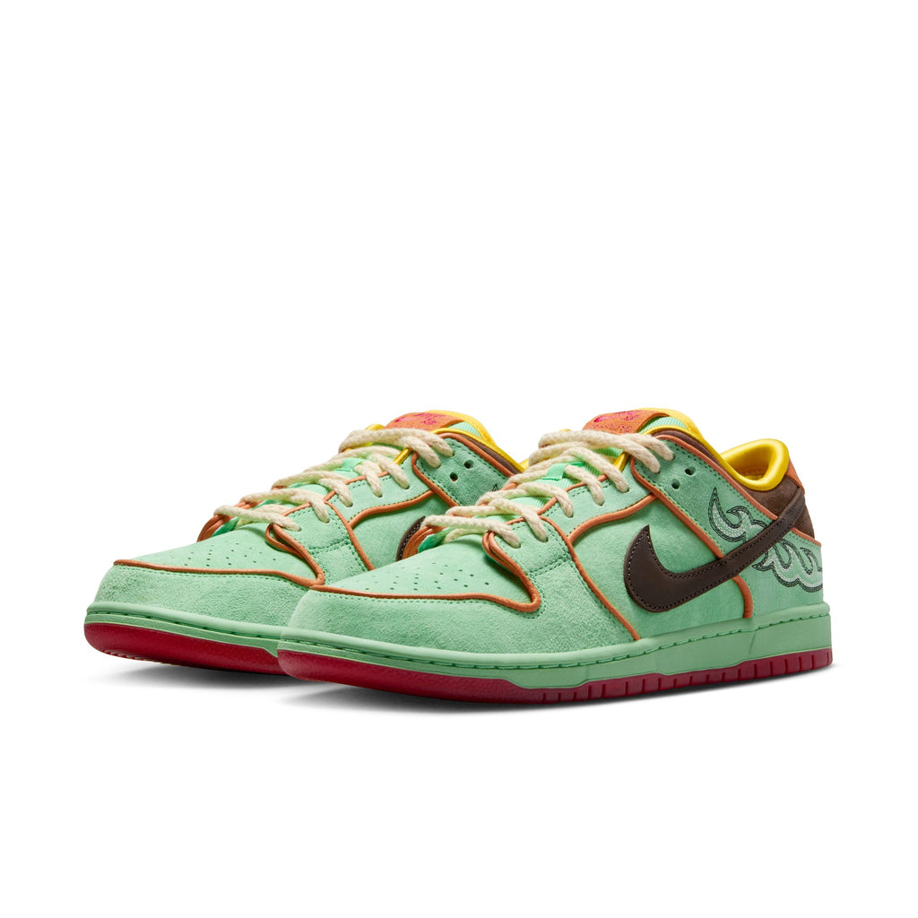 The NIKE SB Rodeo Dunk Low in Tourmaline/Baroque Brown-Monarch features a mint green upper, brown swooshes, yellow lining, red outsoles, and multicolored accents—ideal for street style or celebrating skateboarding scholarships.