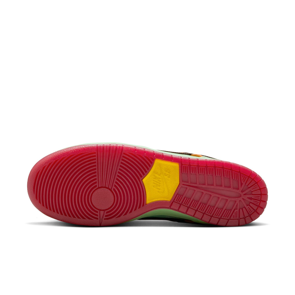 Bottom view of the NIKE SB RODEO DUNK LOW TOURMALINE/BAROQUE BROWN-MONARCH by Nike, showcasing a Southwest-inspired multicolor sole with red, yellow, green, and translucent segments, unique tread patterns, and a visible Nike logo.