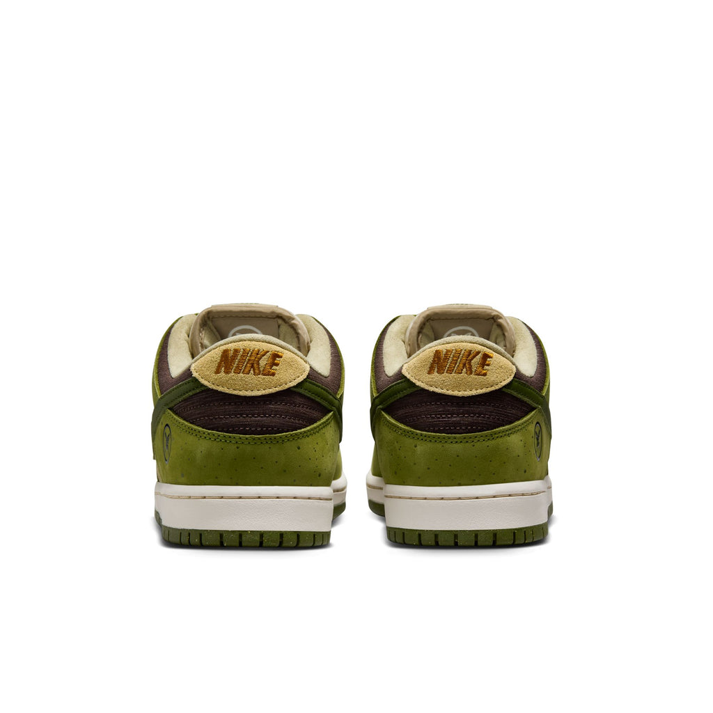 The back view of the RAFFLE WINNER NIKE SB YUTO "MATCHA" DUNK LOW PRO sneakers in asparagus, legion green, and light khaki showcases Nike's iconic heel logo, crafted from premium materials for durable traction.