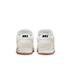 Rear view of two white nike SB DUNK LOW PRO B PALE IVORY / SUMMIT WHITE skate shoes with gum soles and black Nike logos on the heels, shown against a white background.