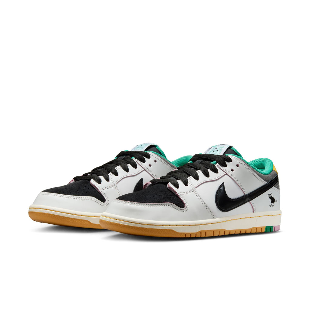The nike NIKE SB X CSEF DUNK LOW SUMMIT WHITE / BLACK-WHITE-IRON GREY features a low-top design with white, black, and grey accents, a patent leather Swoosh, gum soles, and a small graphic near the heel.