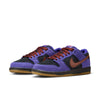 A pair of NIKE SB DUNK LOW PRO PERSIAN VIOLET / OFF NOIR sneakers by Nike, featuring Persian Violet suede, black panels, brown swooshes and laces, and gum rubber soles—an eye-catching style from Bluetile Skateboards.