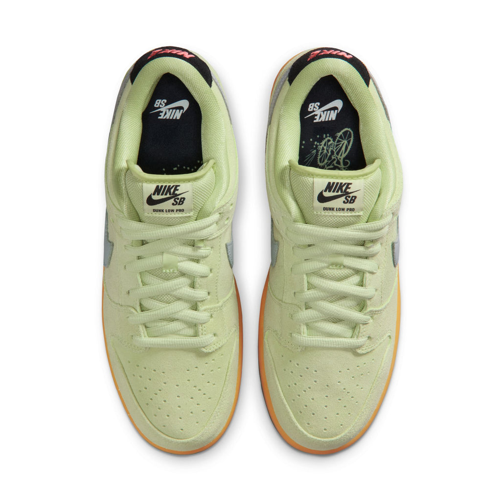 Top view of the NIKE SB DUNK LOW PRO VERDUGO MOUNTAIN sneakers by nike—light green with gum soles, white laces, and black tongue branding—ideal post-ride style after mountain biking in the Verdugo Mountains.