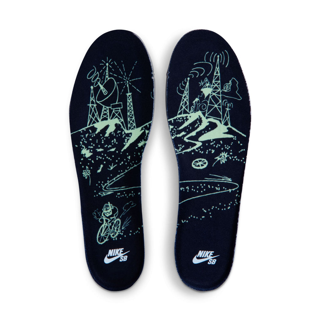 The NIKE SB DUNK LOW PRO VERDUGO MOUNTAIN features navy insoles with neon green radio towers, satellites, and a cyclist biking on a hill inspired by the Verdugo Mountains, plus the nike SB logo at the heel.