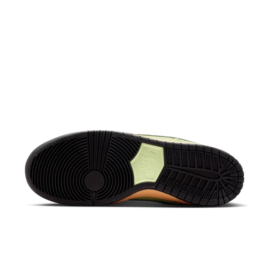 The image shows the black rubber outsole of the nike SB Dunk Low Pro Verdugo Mountain, with circular and linear traction patterns and "NIKE SB" branding at the midfoot—ideal for grip on city streets or the Verdugo Mountains.