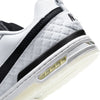 Close-up of the heel of the NIKE SB P-ROD 1 ZOOM AIR LOW 20 YEARS in white/black-white-clear, featuring a black stripe, textured pattern, Zoom Air cushioning, and a translucent outsole—ideal for skateboarding enthusiasts or CSEF supporters.