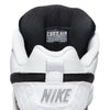 Close-up of the heel and tongue of the Nike SB P-ROD 1 Zoom Air Low 20 Years sneaker in white/black, displaying "ZOOM AIR PAUL RODRIGUEZ PROPRIETARY" on the tongue label, honoring skateboarding scholarships and education.