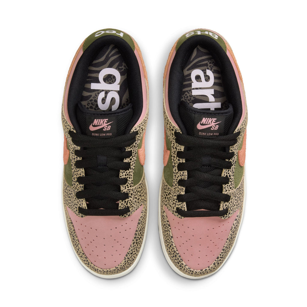 Top view of nike SB x Arts-Rec Dunk Low Pro sneakers in khaki, amber brown, rough green, rust pink, and black with animal print accents and text on the insoles.