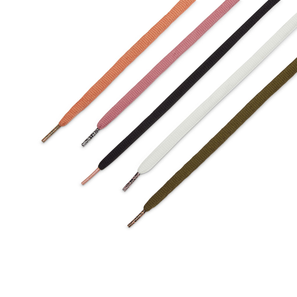 Five flat laces in orange, pink, black, white, and olive green with metal aglets are arranged diagonally on white—ideal for pairing with your nike NIKE SB X ARTS-REC DUNK LOW PRO KHAKI/AMBER BROWN-RUST PINK sneakers.