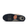Bottom view of the NIKE SB x Arts-Rec Dunk Low Pro in Khaki/Amber Brown/Rough Green/Rust Pink/Black/Sail, featuring a dark blue rubber sole with circular traction, a translucent section, and a salmon Nike SB logo on the arch.