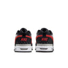 Pair of black Nike SB P-Rod 1 Zoom Air Low sneakers in Varsity Red-Flint Grey-Black, viewed from the back, with red “NIKE” text on the heel—a signature Paul Rodriguez skate shoe crafted in premium leather.