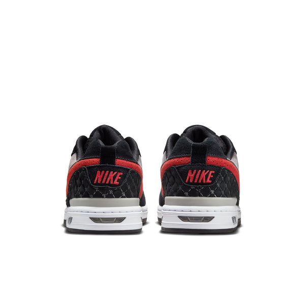 Pair of black Nike SB P-Rod 1 Zoom Air Low sneakers in Varsity Red-Flint Grey-Black, viewed from the back, with red “NIKE” text on the heel—a signature Paul Rodriguez skate shoe crafted in premium leather.