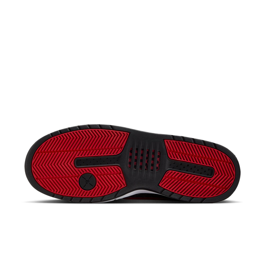 The image displays the rubber sole in black and varsity red of the NIKE SB P-ROD 1 ZOOM AIR LOW BLACK / VARSITY RED-FLINT GREY-BLACK by Nike, featuring a circular logo with a central silhouette.