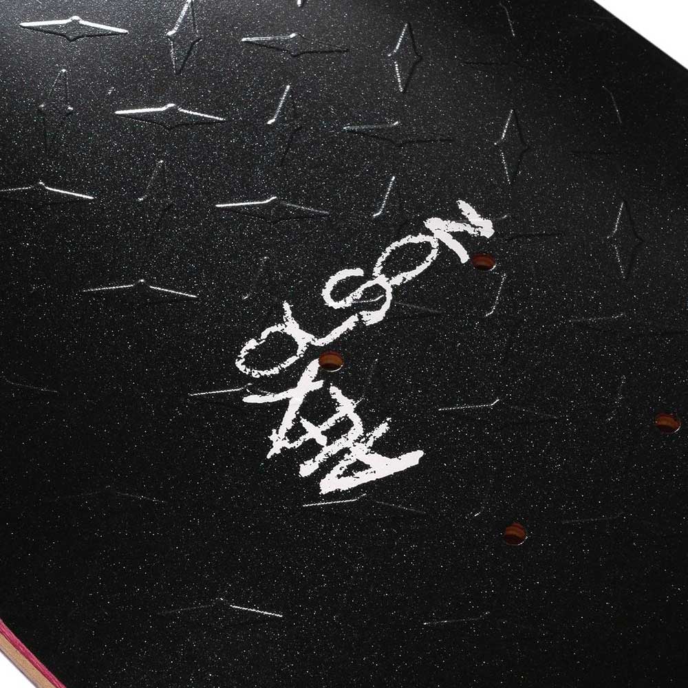 Close-up of the VIOLET X ALEX OLSON SIVER METAL skateboard deck by violet, featuring black textured grip tape, a diamond plate graphic, "Alex Olson" in white, and visible bolt holes.