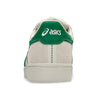 Rear view of a light gray ASICS JAPAN PRO BIRCH / KALE sneaker with green accents and a white sole, displaying the ASICS logo on the green heel patch.