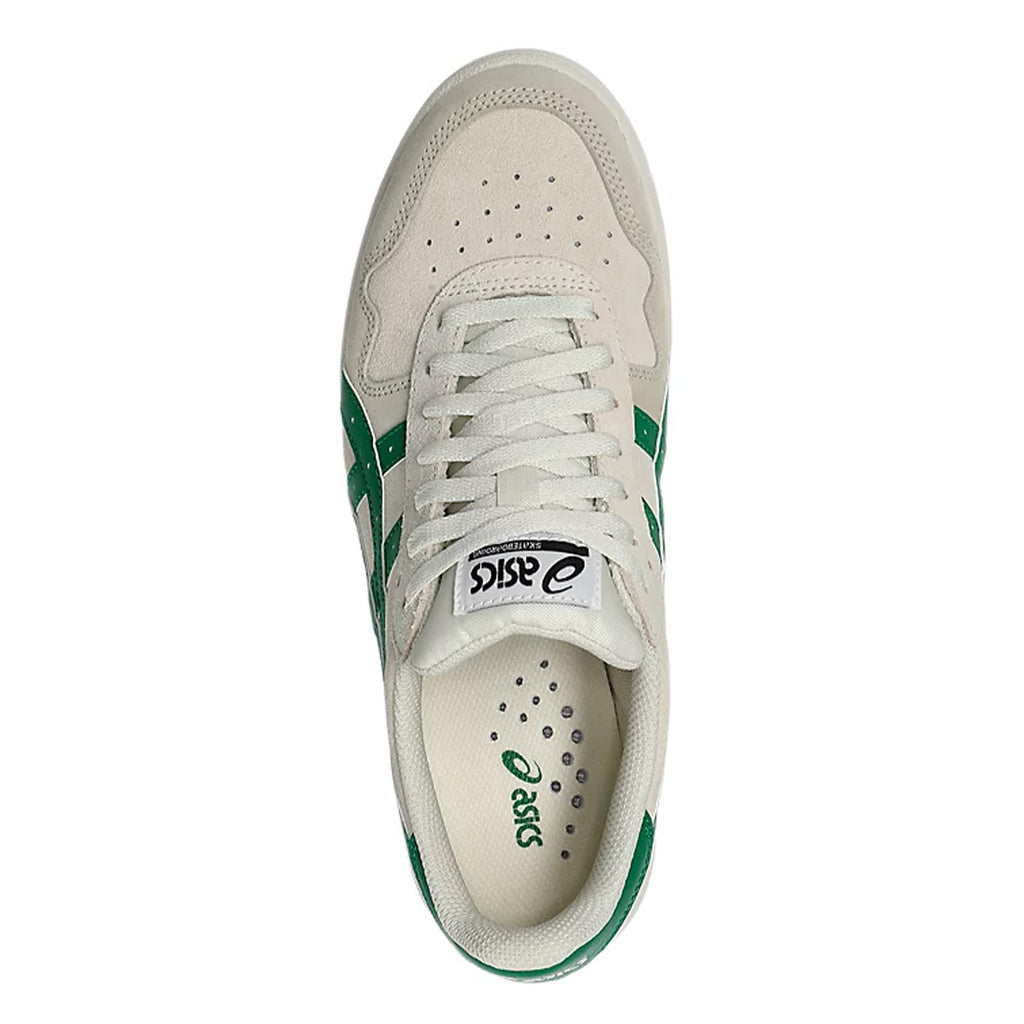 Top view of a pair of ASICS JAPAN PRO BIRCH / KALE skateboarding shoes with white laces, beige suede paneling, and green accents.