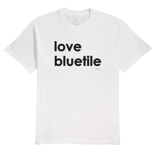 A white t - shirt with the words 'Love Bluetile'. Printed with a Nike SB tag.
