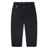 A pair of BUTTER GOODS SANTOSUOSSO DENIM PANT WASHED BLACK jeans with buttons on the side in a baggy fit.