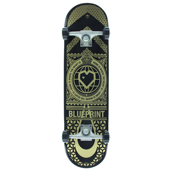 A black and gold blueprint complete skateboard with intricate patterns and the word "Blueprint" on the deck, designed by Danny Way.