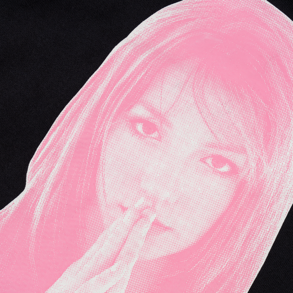 The WELCOME X BRITNEY BELIEVE PIGMENT-DYED HOODIE BLACK features a striking design with a pink halftone portrait of a woman with long hair, holding her hand near her mouth, set against a black background. This image looks fantastic screen-printed on the black hoodie from WELCOME.