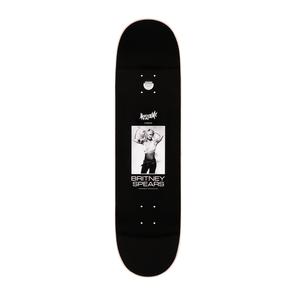 A black skateboard deck featuring an image of a person posing and the text "Britney Spears" below the image. Part of the WELCOME X BRITNEY series, this 8.75 POPSICLE board named WELCOME X BRITNEY SNAKE by WELCOME is perfect for fans and skaters alike.