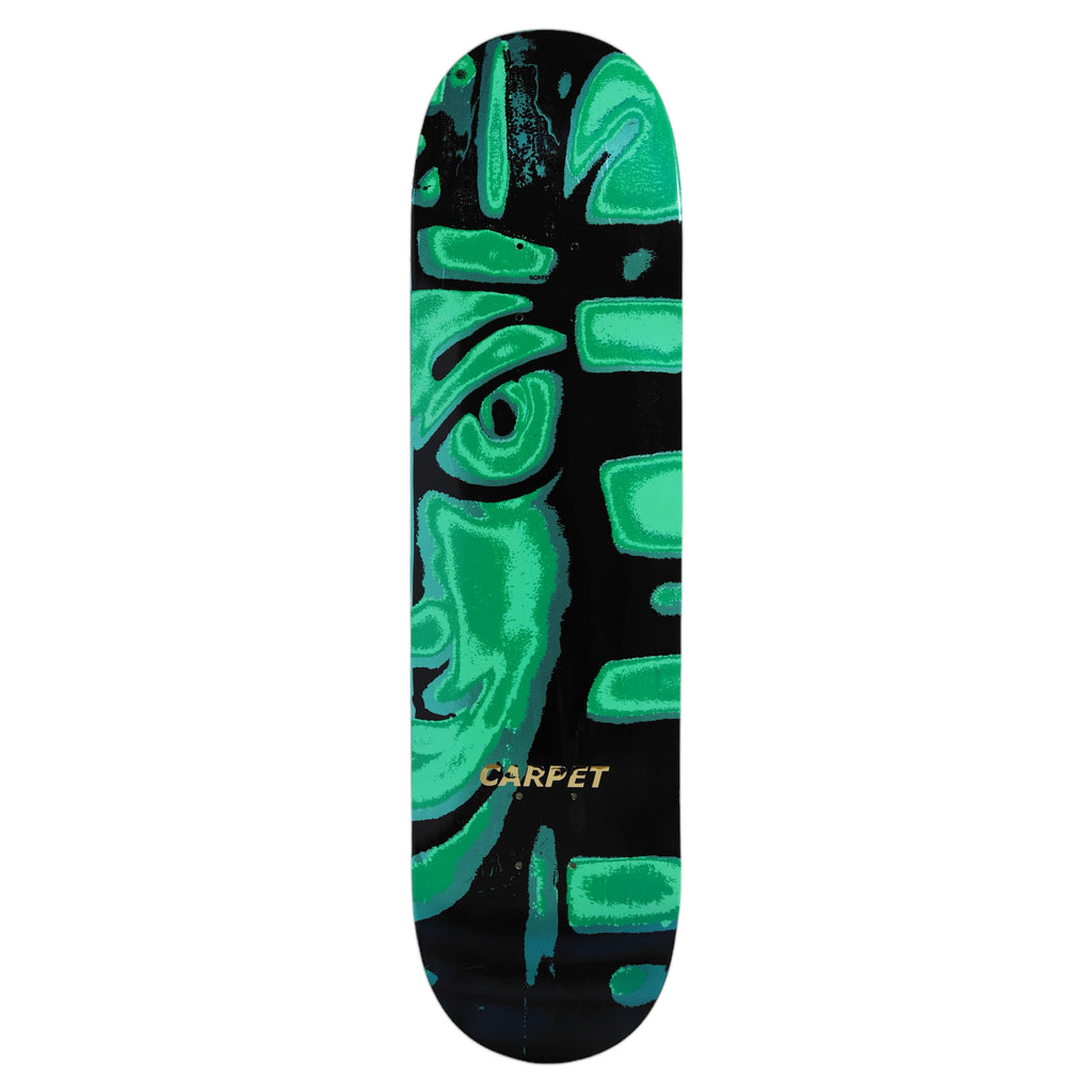 The CARPET EGYPT GREEN skateboard deck from Carpet Co. features a hand-screened abstract design in green and black with an eye and bold yellow "CARPET" text. Each piece is meticulously crafted, individually numbered, and a unique addition to any collection.