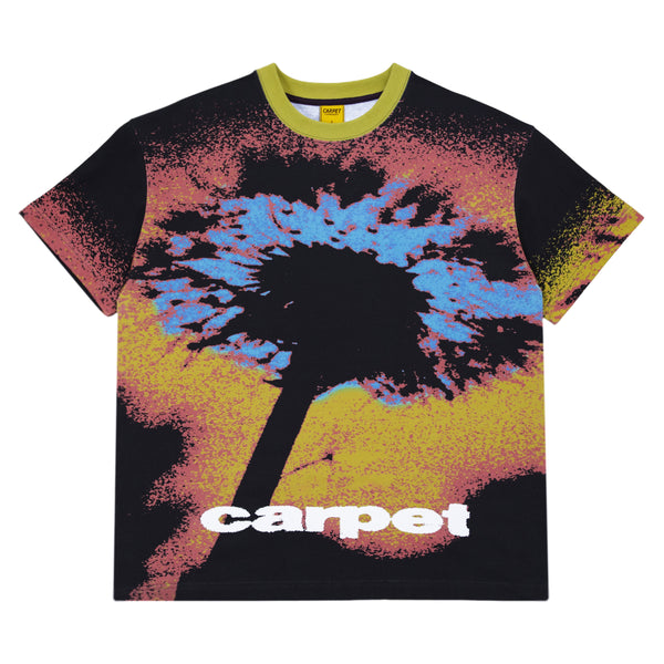 Introducing the Carpet Dandelion Tee Yellow from Carpet Co.: a vibrant yellow T-shirt featuring an abstract dandelion flower design with the word "carpet" elegantly placed at the bottom.