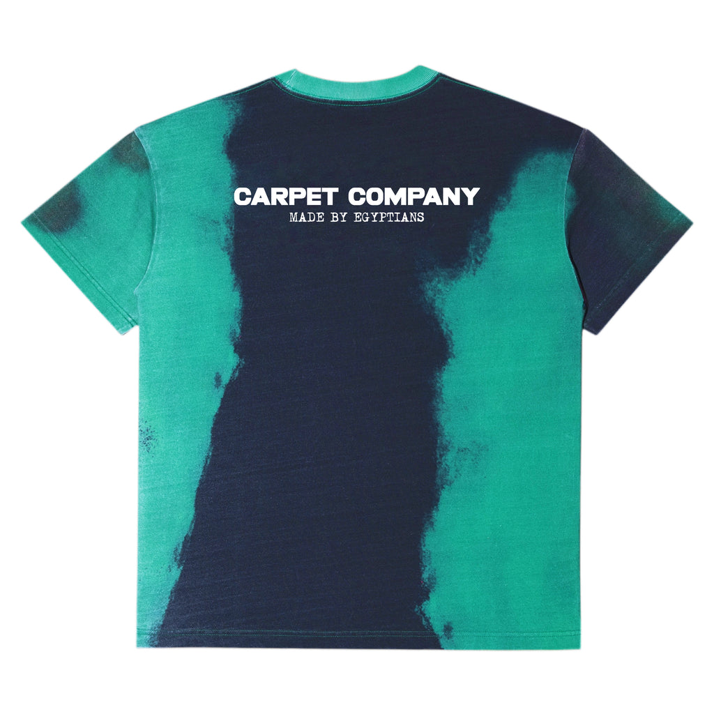 The Carpet Co. Egypt Tee Green is a brushed tie-dye t-shirt in vibrant green and black, with "CARPET CO. MADE BY EGYPTIANS" strikingly printed on the back.