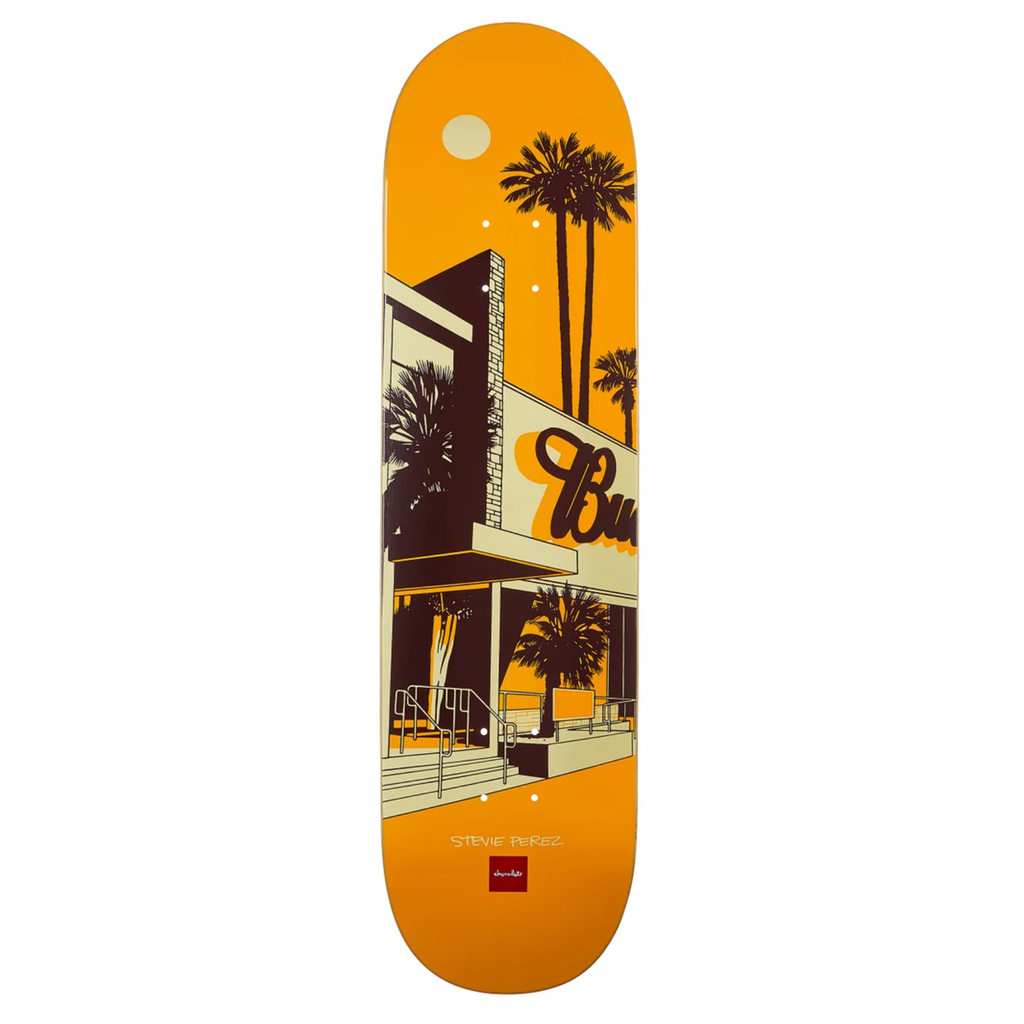 A skateboard deck with an orange toned image of a Budweiser building and stairs. 