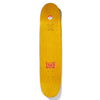 A yellow skateboard deck from CHOCOLATE, known as the "CHOCOLATE X CHICO STIX NICARAGUAN SUNRISE REISSUE," features vibrant red and pink text near the tail, capturing a playful spirit.